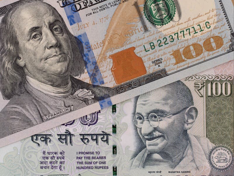 Sedlar för US dollar och för indisk rupie, valutautbyte, pengar c royaltyfri foto Sedlar för US dollar och för indisk rupie, valutautbyte, pengar c royaltyfri foto