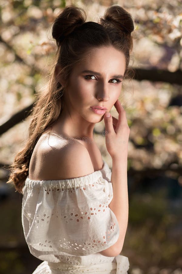 Seductive Brunette Young Lady With Closed Eyes Posing With Rose Stock