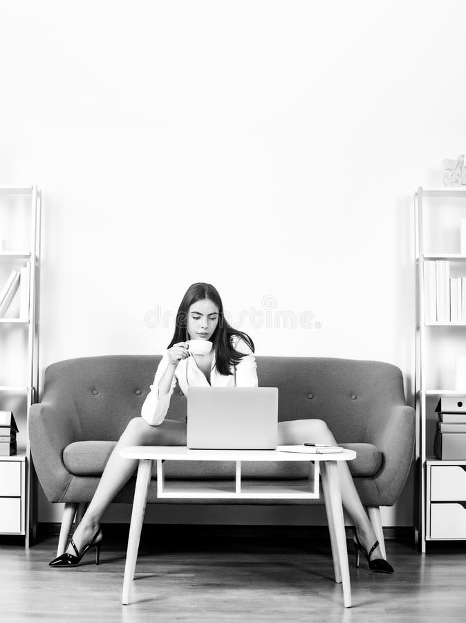 Seductive Business Woman with Cup Coffee at Desk in Office Interior ...