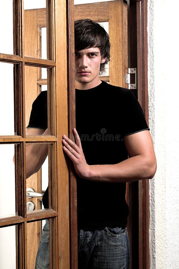 Seductive man in doorway