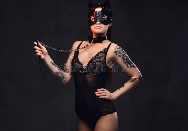 Girls In Black Lingerie Near Bdsm Metal Cross Stock Photo, Picture and  Royalty Free Image. Image 111756722.