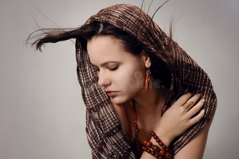 Seductive woman with scarf