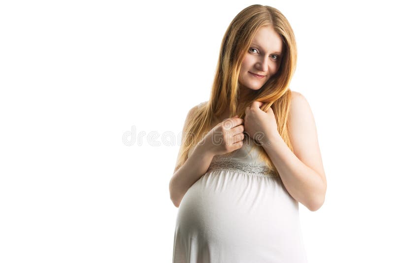 Seductive young pregnant blonde woman