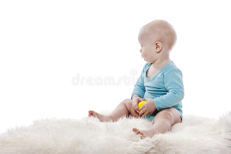Seduta del neonato fotografie stock libere da diritti Seduta del neonato fotografie stock libere da diritti