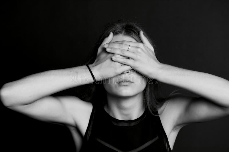 See no evil. The girl closes your eyes. stock photo See no evil. The girl closes your eyes. stock photo