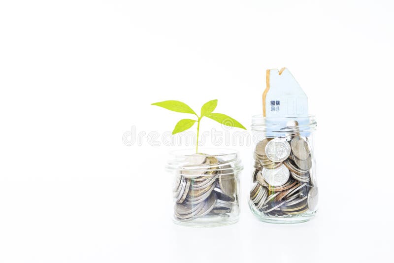 Seedling plant growin from coins in glass bottle, saving money, buy new house, house loan, property and banking business, financial concept