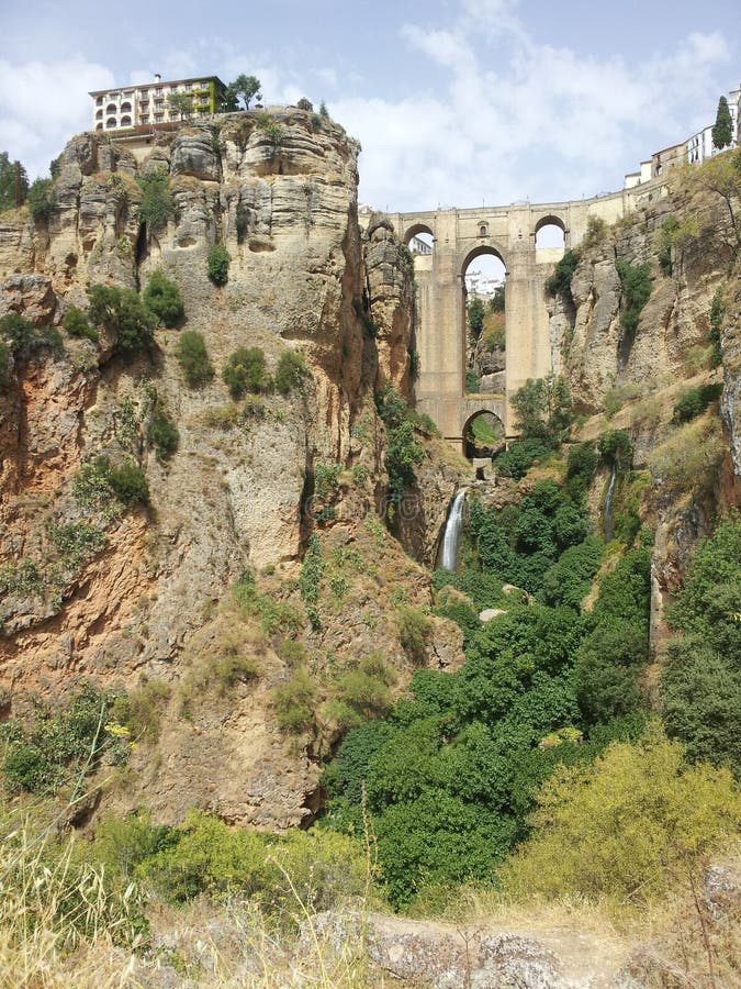 View of Majestic bridge at Ronda from the gorge royalty free stock photography View of Majestic bridge at Ronda from the gorge royalty free stock photography