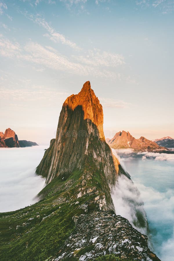 Segla Mountain sunset peak Landscape over clouds stock photography Segla Mountain sunset peak Landscape over clouds stock photography