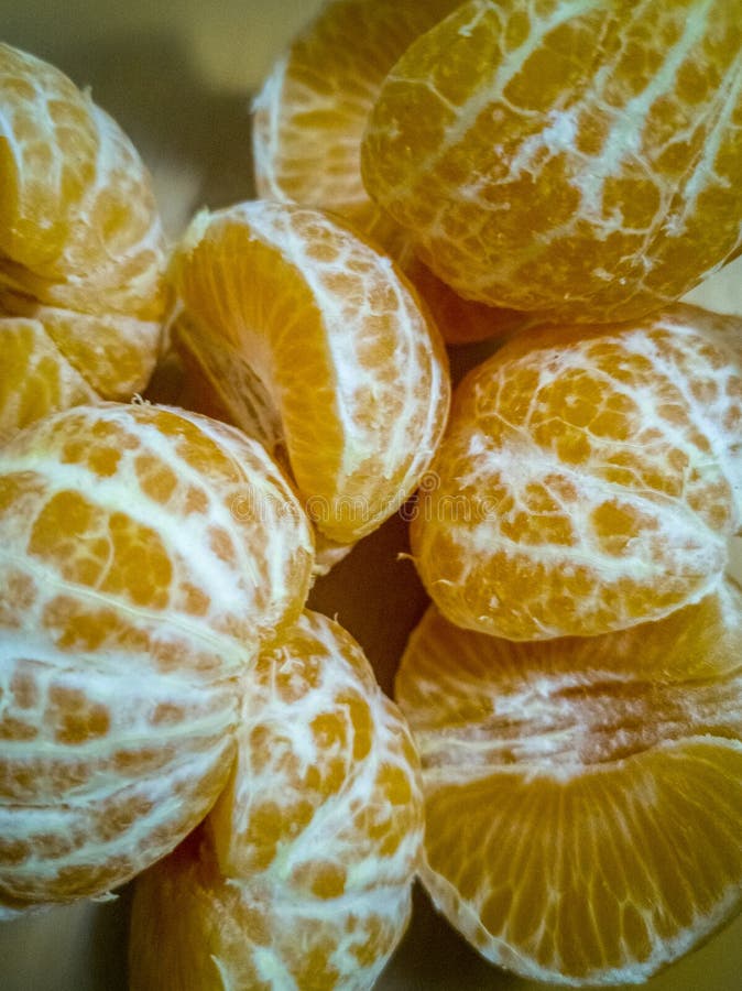 Segmentos alaranjados do mandarino imagem de stock Segmentos alaranjados do mandarino imagem de stock