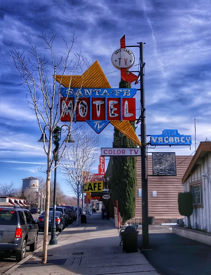 A mid century styled motel sign advertises color TV. A mid century styled motel sign advertises color TV.