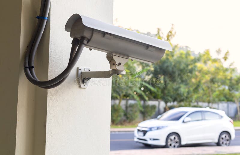 Segurança da câmara de televisão CCTV no estacionamento ao ar livre Com espaço de cópia para texto ou design