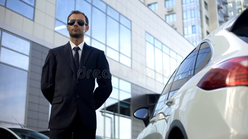 Segurança da monitoração de segurança da escolta pessoal do distrito da pessoa importante foto de stock royalty free Segurança da monitoração de segurança da escolta pessoal do distrito da pessoa importante foto de stock royalty free