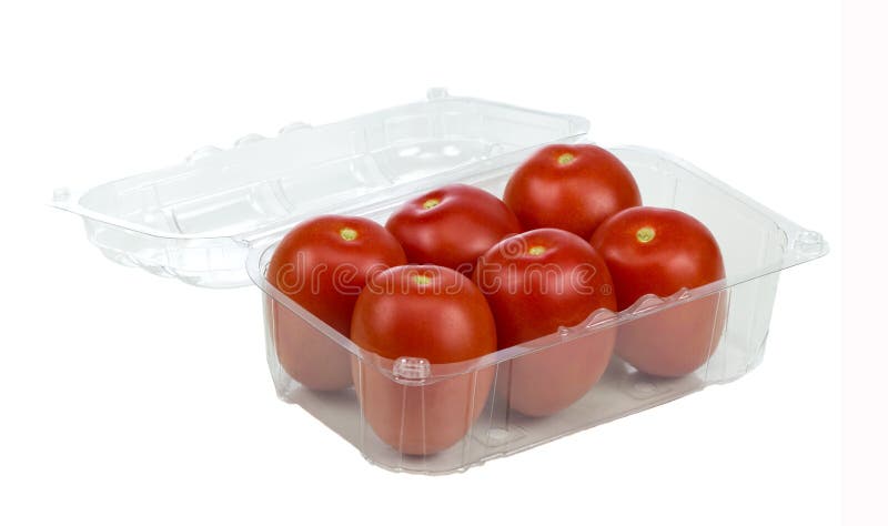 Six Red Tomatoes In Plastic Retail Supermarket Packaging isolated on white background. Six Red Tomatoes In Plastic Retail Supermarket Packaging isolated on white background