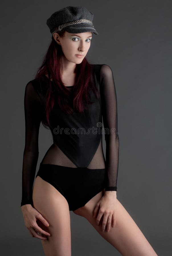 Seksowna kobieta w Leotard i kapeluszu obrazy stock Seksowna kobieta w Leotard i kapeluszu obrazy stock