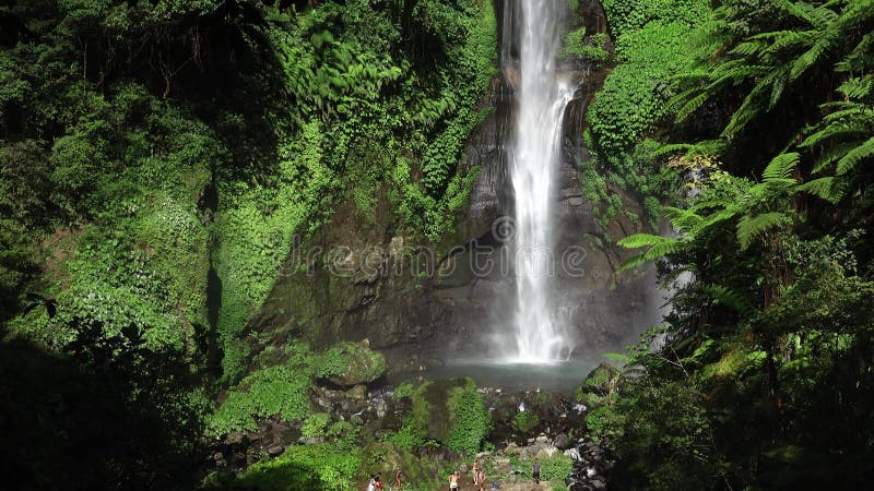 Sekumpul Waterfall in Bali with tourists, Indonesia
