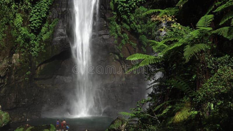 Sekumpul Waterfall in Bali with tourists, Indonesia