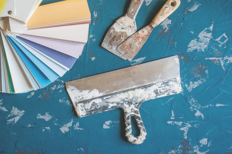 Select the Color of Paint for the Walls. Old Tools for Painting and