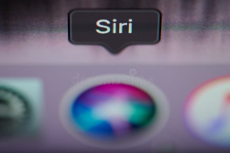 New york, USA - july 26, 2019: Selecting siri application on computer macro close up view in pixel screen