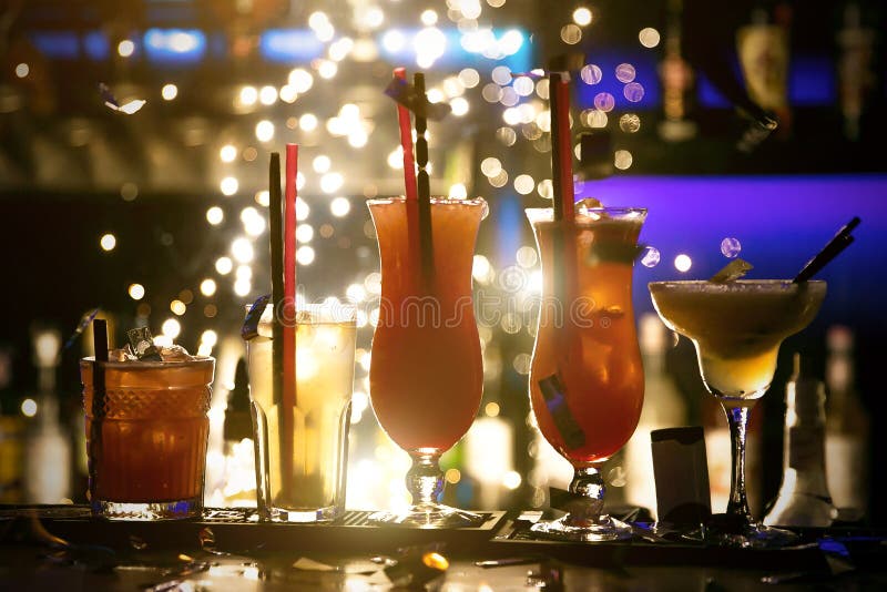 Selection of Cocktails Martini Spritz Bramble Gin Tonic Bar Black Background Fireworks Stock