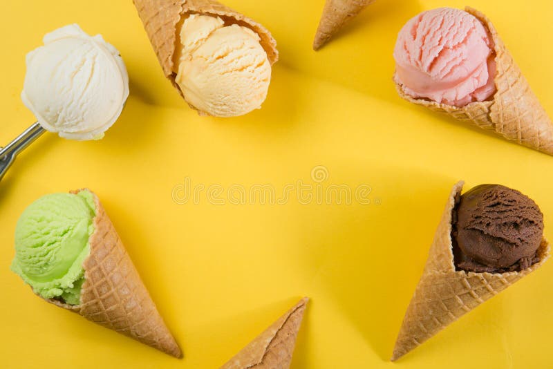 Melted Yellow Fruit Ice Cream in a Waffle Horn on a Light Blue