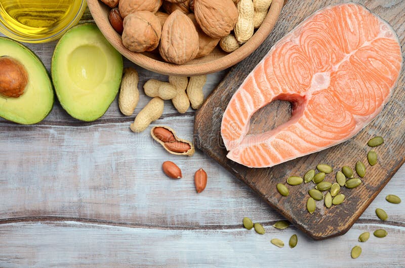Selection of Healthy Unsaturated Fats, Omega 3 Fish, Avocado, Olives