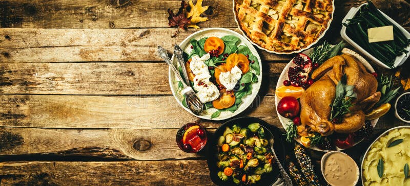 Selection of traditional thanksgiving food - turkey, mashed patatoes, green beans, apple pie on rustic background