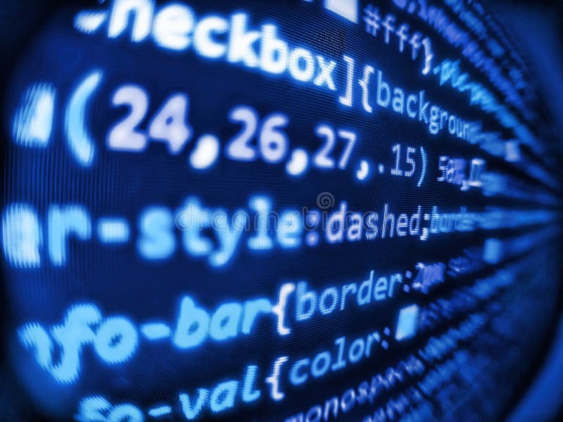 Selective depth of field focus. Mobile app developer. Web site codes on computer monitor. Mobile app building. Programmer royalty free stock images
