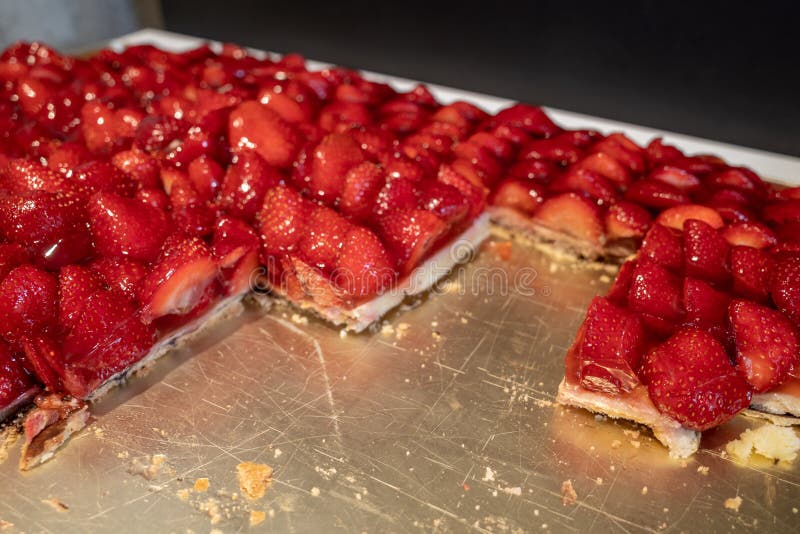 Traditional German sliced fresh strawberry cake tart or pie.