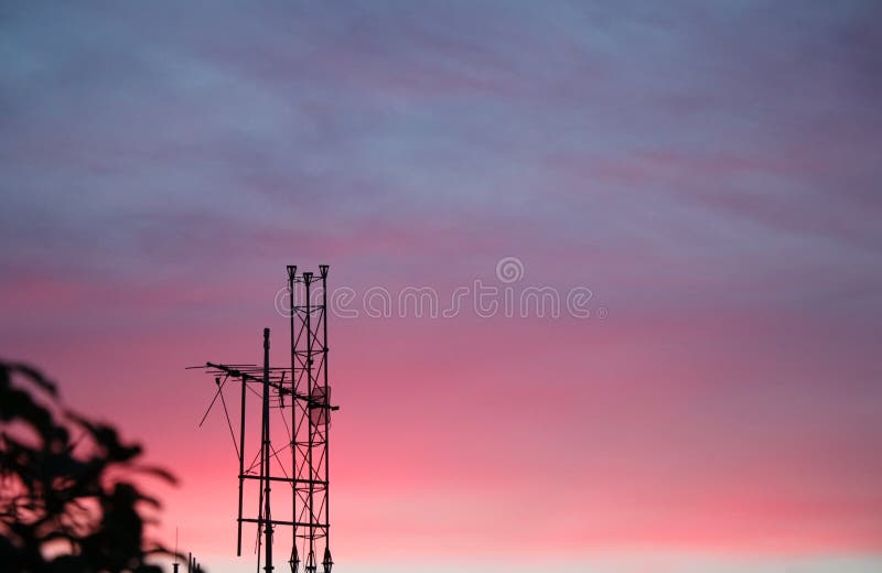 Selective Focus at Digital Tv Transmission Tower on the Roof Stock