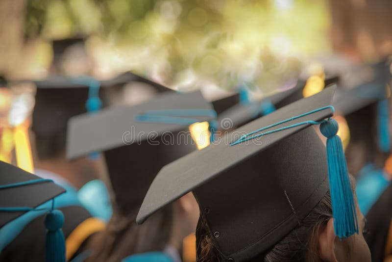 Selective Focus On Graduation Cap Of Front Female In Graduation