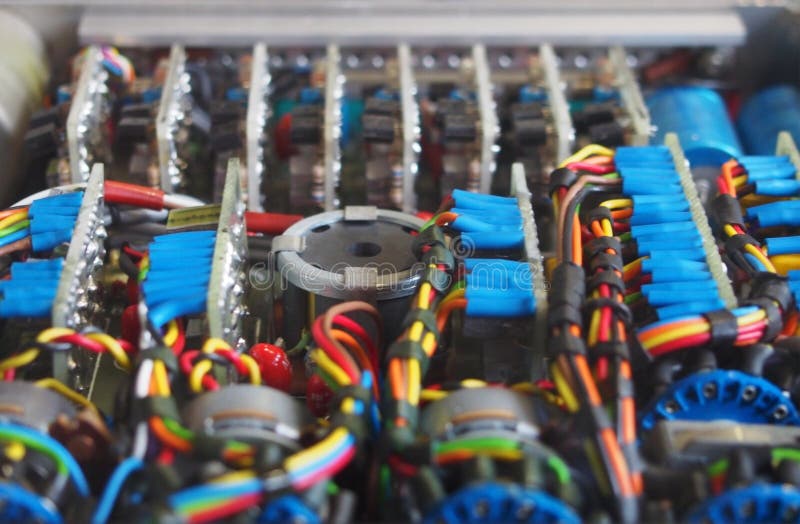 Selective focus image of complex colored wiring and connectors joining circuit boards with electrical components stock images Selective focus image of complex colored wiring and connectors joining circuit boards with electrical components stock images