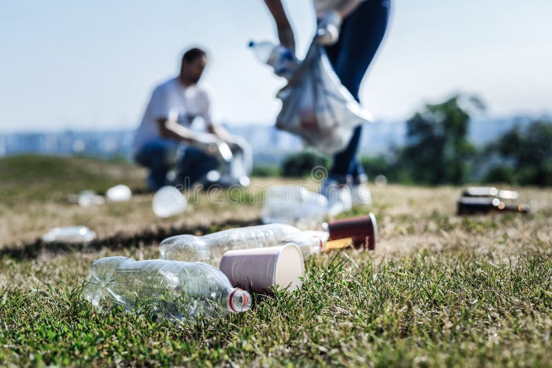 Litter on grass stock photo. Image of left, wrapper, garbage 24068144