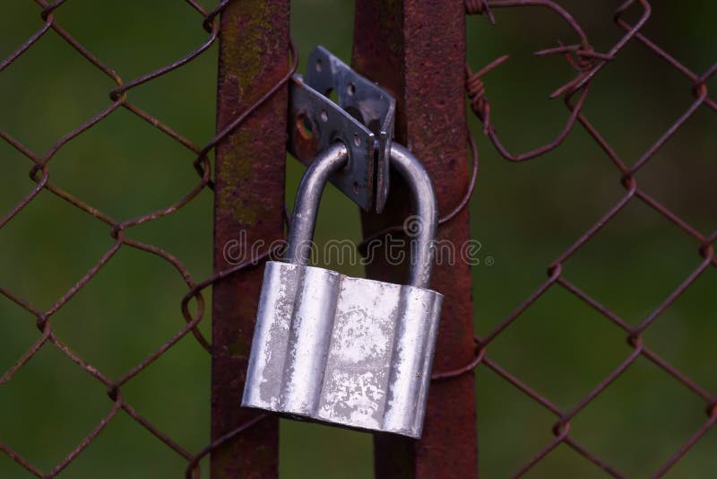 Padlock on fence stock photo. Image of steel, metal 240821010