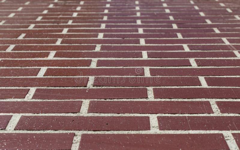 Selective Focus of the Red Ceramic Brick Wall. Order and Alignment