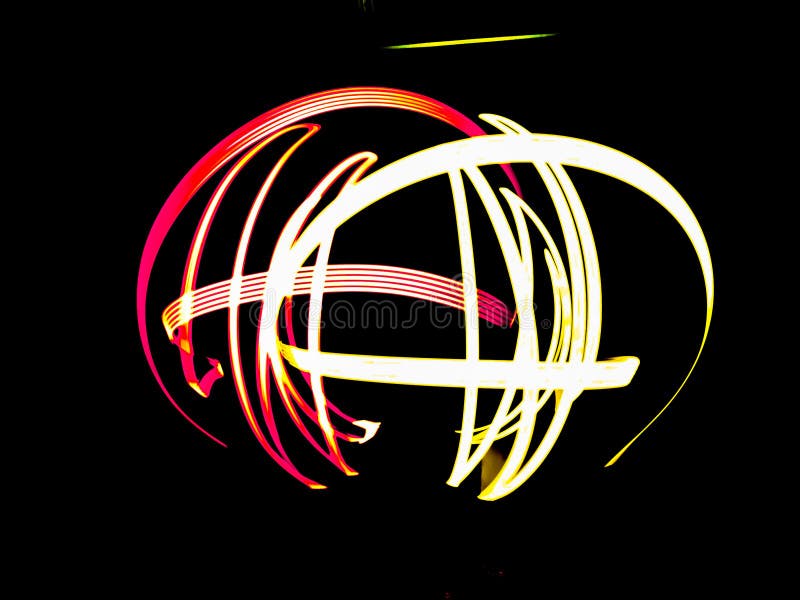 Selective focus. Red and yellow light painting,long exposure photography simple pattern against a black background. royalty free illustration
