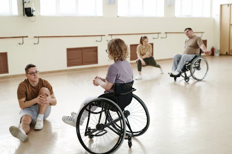 Group of Diverse Dancers Doing Stretching Exercises royalty free stock image