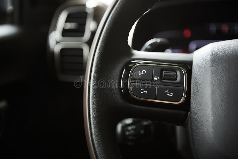 Selective Focus of Steering Wheel Near Gear Shift Handle in Luxury Car