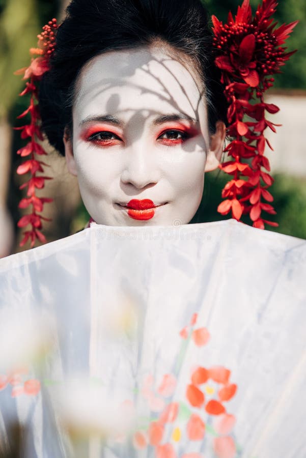 Geisha with umbrella stock photo. Image of jewellery, hairdress 134894