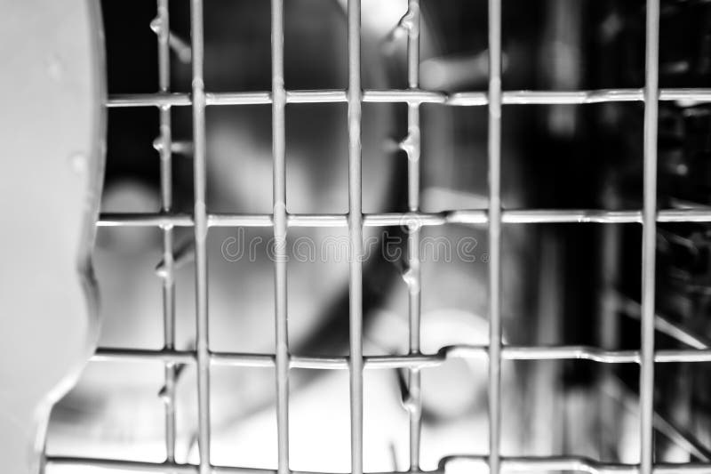 Selective Focus on Upper Dishwasher Plastic Coated Wire Rack. Stock