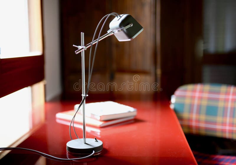 Selective Focused Shot Of A Gray And White Articulated Desk Lamp