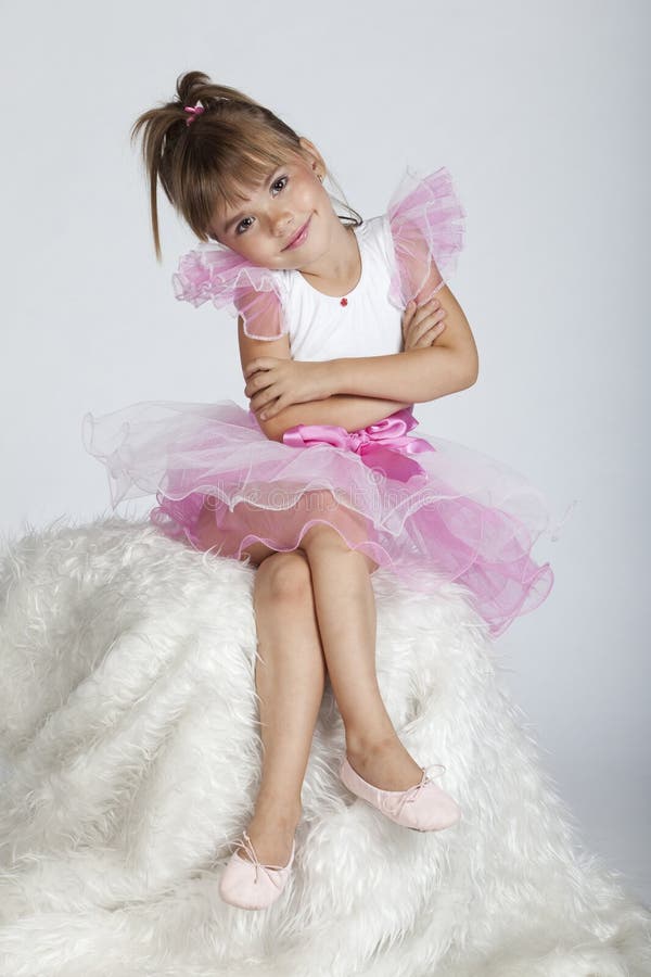 Self confident little ballerina posing