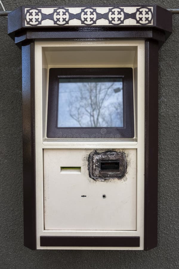 Self-service payments-terminal safter hacking the bill acceptor. stock photo Self-service payments-terminal safter hacking the bill acceptor. stock photo