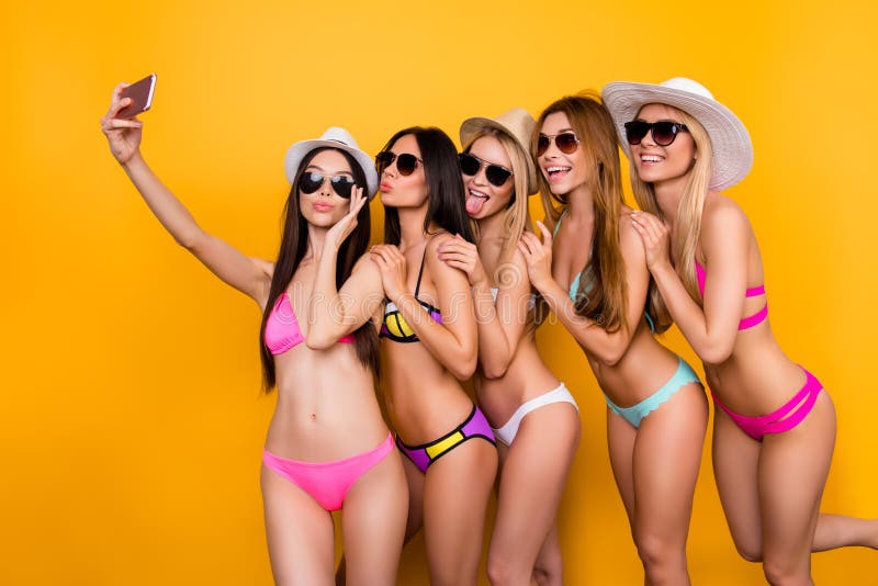 Selfie time, babes! Five girlfriends in swim suits, sunglasses a