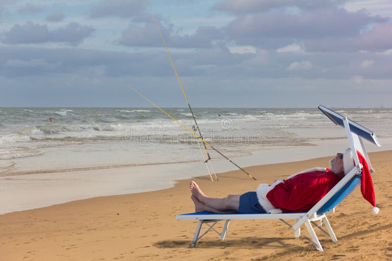 Semester av Santa Claus Hav strand, snurr, trevligt väder san fotografering för bildbyråer Semester av Santa Claus Hav strand, snurr, trevligt väder san fotografering för bildbyråer