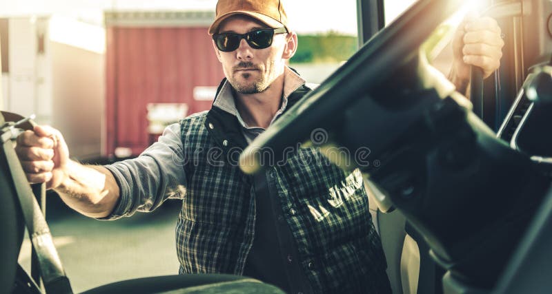 Semi Truck Driver and His Modern Truck Tractor. Transportation Industry stock images