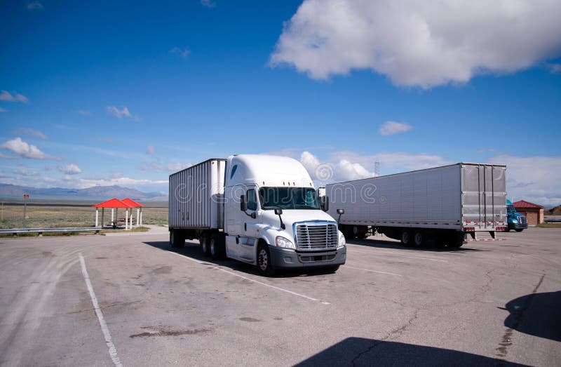 Semi Trucks Standing In The Parking Lot Of Rest Area Nevada Stock Photo