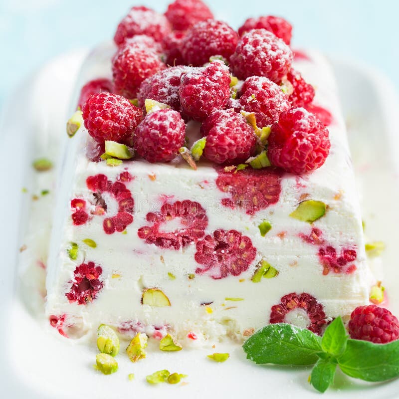 Semifredo, Italian Ice Cream Dessert, with Raspberry and Pistachios