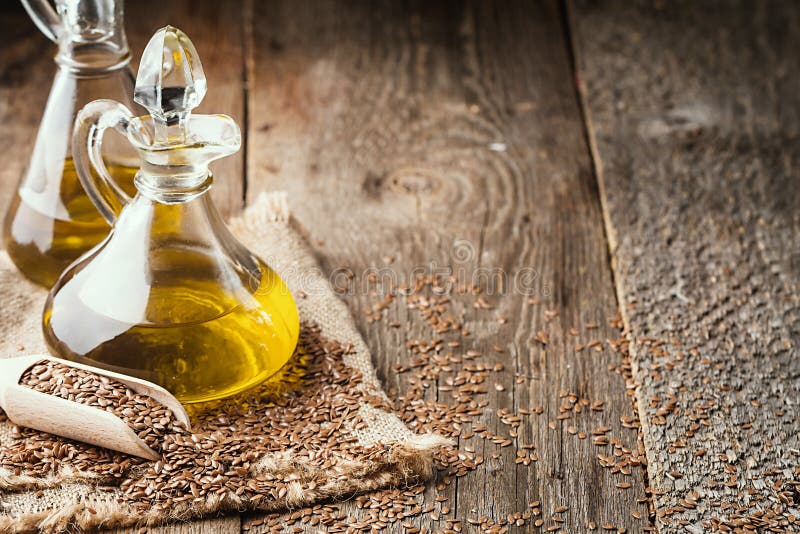 Semillas de lino y aceite de linaza imágenes de archivo libres de regalías Semillas de lino y aceite de linaza imágenes de archivo libres de regalías