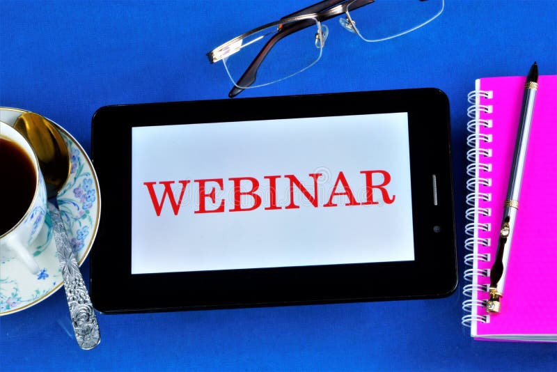 Webinar â€” web conference, online meetings or presentations over the Internet at the computer. A computer tablet, reading glasses, a notebook, a pen for notes, a Cup of tea for cheerfulness. Webinar â€” web conference, online meetings or presentations over the Internet at the computer. A computer tablet, reading glasses, a notebook, a pen for notes, a Cup of tea for cheerfulness