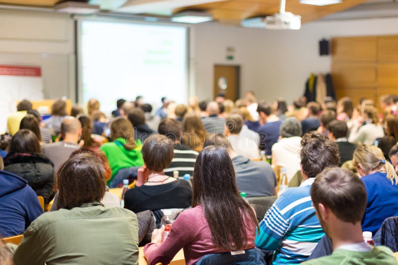 Seminarium p? universiteth? rsalen royaltyfri bild